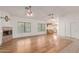 Bright living room showcasing hardwood floors and views into the kitchen at 16028 N Nyack Dr, Fountain Hills, AZ 85268