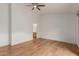 Large primary bedroom featuring hardwood floors with an en-suite bathroom entrance at 16028 N Nyack Dr, Fountain Hills, AZ 85268