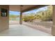 Spacious covered patio with desert landscaping and mountain views creating a serene outdoor space at 16028 N Nyack Dr, Fountain Hills, AZ 85268