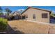 Spacious backyard featuring privacy walls, a covered patio, and lots of space at 16167 W Cottonwood St, Surprise, AZ 85374