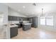 A modern kitchen featuring sleek countertops, stainless steel appliances, and stylish pendant lighting at 16167 W Cottonwood St, Surprise, AZ 85374