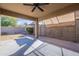 Covered patio with ceiling fan overlooking the backyard with a gazebo at 16167 W Cottonwood St, Surprise, AZ 85374