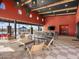 Inviting clubhouse interior with comfortable seating and a view of the pool, perfect for relaxation at 17624 W Adams St, Goodyear, AZ 85338