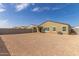 Large backyard featuring ample space for landscaping and outdoor activities, with privacy wall at 18449 E Eloisa Dr, Gold Canyon, AZ 85118