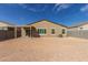 Spacious backyard with a covered patio, offering shade and relaxation at 18449 E Eloisa Dr, Gold Canyon, AZ 85118