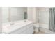Bathroom with a double sink vanity, shower with glass door and neutral decor at 18449 E Eloisa Dr, Gold Canyon, AZ 85118