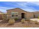Attractive single-story home with a low-maintenance landscape and a welcoming entrance at 18449 E Eloisa Dr, Gold Canyon, AZ 85118