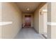 Covered front porch with a decorative front door and welcoming decor accents at 18449 E Eloisa Dr, Gold Canyon, AZ 85118