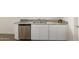 A kitchen area with stainless steel appliances, granite countertops, and white cabinets at 18449 E Eloisa Dr, Gold Canyon, AZ 85118