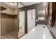 Bathroom vanity featuring and mirrors, with entry to the walk-in closet at 201 S Greenfield Rd # 152, Mesa, AZ 85206