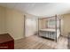 Bright bedroom with hardwood floors and natural light, creating a serene space at 201 S Greenfield Rd # 152, Mesa, AZ 85206