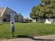 Community dog park with pet waste station and green grass for residents to enjoy at 201 S Greenfield Rd # 152, Mesa, AZ 85206