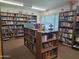 Community library with a wide selection of books and a cozy reading area at 201 S Greenfield Rd # 152, Mesa, AZ 85206