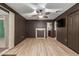 Charming living area with updated floors, a ceiling fan, and convenient closet space at 201 S Greenfield Rd # 152, Mesa, AZ 85206