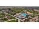 Aerial view of a community pool, playgrounds, and landscaped common areas at 23145 E Stonecrest Dr, Queen Creek, AZ 85142