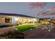 Spacious backyard features artificial turf, gravel, and outdoor seating at 23145 E Stonecrest Dr, Queen Creek, AZ 85142