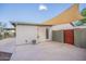 Backyard with covered patio and gate at 2317 E Concorda Dr, Tempe, AZ 85282