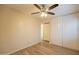 Cozy bedroom with new floors and an adjacent closet at 2317 E Concorda Dr, Tempe, AZ 85282