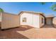 Shows the exterior of the house and an adjacent storage shed, offering practical storage solutions at 2317 E Concorda Dr, Tempe, AZ 85282