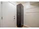 Hallway features painted cabinets and a white door at 2317 E Concorda Dr, Tempe, AZ 85282
