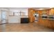 A spacious eat-in kitchen featuring wood cabinets and stainless steel appliances at 2317 E Concorda Dr, Tempe, AZ 85282