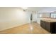 Open kitchen area with tile floors and a pass-through to the living room at 2317 E Concorda Dr, Tempe, AZ 85282