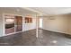Large patio features tile flooring, neutral walls, and views of interior rooms at 2317 E Concorda Dr, Tempe, AZ 85282