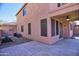 Charming backyard featuring a covered patio area and low-maintenance landscaping at 35210 N 34Th Ln, Phoenix, AZ 85086