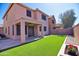 Backyard featuring an artificial turf at 35210 N 34Th Ln, Phoenix, AZ 85086