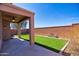 Outdoor living area with artificial turf at 35210 N 34Th Ln, Phoenix, AZ 85086
