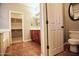 Bathroom featuring tile floors, a closet, and a vanity at 35210 N 34Th Ln, Phoenix, AZ 85086