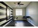 A unique room with a salon chair, mirror, and modern black-and-white decor at 35210 N 34Th Ln, Phoenix, AZ 85086