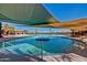 Stunning community pool with sunshades, ideal for hot days and relaxation at 3751 N Hidden Canyon Dr, Florence, AZ 85132