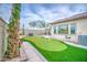 Backyard putting green at 4207 S Electron --, Mesa, AZ 85212