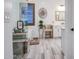 Bright bathroom with a soaking tub, glass-enclosed shower, and wood-look tile floors at 4207 S Electron --, Mesa, AZ 85212