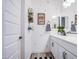 Bright bathroom features a white vanity with white quartz countertop, decorative fixtures and a charming southwestern vibe at 4207 S Electron --, Mesa, AZ 85212