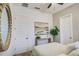 Cozy bedroom with neutral tones, stylish mirror and small table with plants at 4207 S Electron --, Mesa, AZ 85212