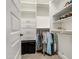 Organized walk-in closet with ample storage space, shelves, and hanging rods at 4207 S Electron --, Mesa, AZ 85212