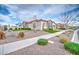 Beautiful home with a well-manicured front yard, desert landscaping, and inviting walkway at 4207 S Electron --, Mesa, AZ 85212