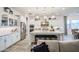 Bright and spacious kitchen with a large island, stainless steel appliances, and plenty of counter space at 4207 S Electron --, Mesa, AZ 85212