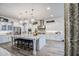 Modern kitchen featuring a large island, stainless steel appliances, and elegant pendant lighting at 4207 S Electron --, Mesa, AZ 85212