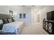 Spacious primary bedroom featuring a decorative headboard, neutral colors and lots of natural light at 4207 S Electron --, Mesa, AZ 85212