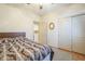 This bedroom includes a comfortable bed, and adjacent bathroom and closet at 4243 S Hackberry Trl, Gold Canyon, AZ 85118