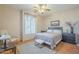 Cozy bedroom featuring a soft-toned color scheme, carpeted floors, and a window for natural light at 4243 S Hackberry Trl, Gold Canyon, AZ 85118