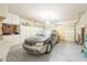 Attached garage featuring ample cabinet storage and epoxy flooring at 4243 S Hackberry Trl, Gold Canyon, AZ 85118