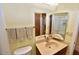 Bathroom vanity featuring an enclosed shower and a large folding mirror at 4328 E Capri Ave # 171, Mesa, AZ 85206