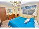 Bedroom featuring a comfortable bed, neutral carpet, and natural light at 4328 E Capri Ave # 171, Mesa, AZ 85206