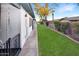 Well-maintained exterior with lush green grass and sidewalks, adding to the property's charm at 4328 E Capri Ave # 171, Mesa, AZ 85206
