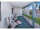 Relaxing covered patio featuring a seating area, ideal for enjoying peaceful moments outdoors at 4328 E Capri Ave # 171, Mesa, AZ 85206