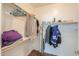 Walk-in closet providing ample storage with rods and shelving at 44115 W Palmen Dr, Maricopa, AZ 85138